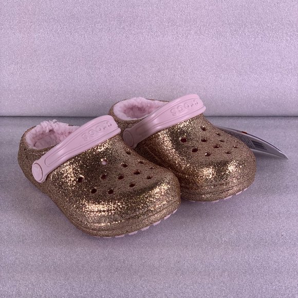 gold crocs with fur